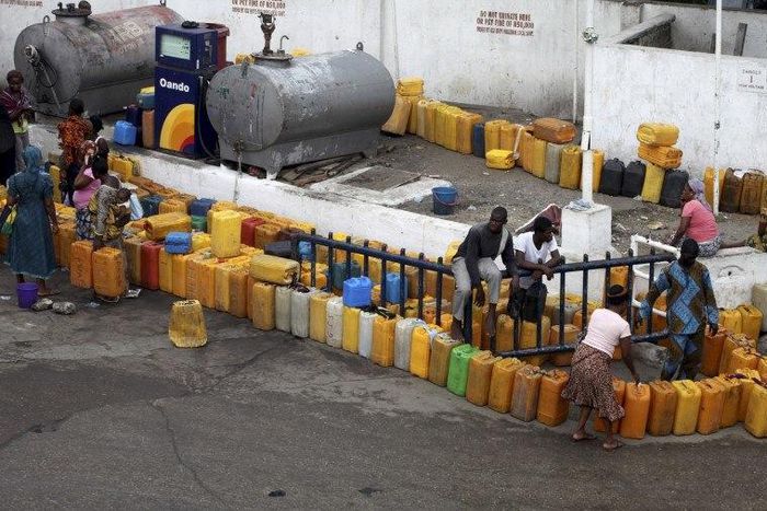 Plastic containers are arranged at a fuel station as people wait to buy kerosene in Nigeria's commercial capital Lagos, in this June 9, 2011 file photo. REUTERS/Akintunde Akinleye/Files
