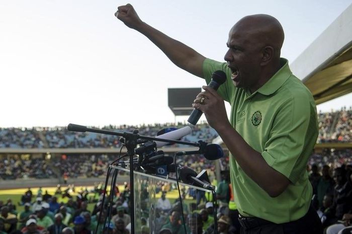 The Association of Mineworkers and Construction Union (AMCU) President Joseph Mathunjwa speaks to striking mine workers at the Royal Bafokeng Stadium in Rustenburg, June 23, 2014.