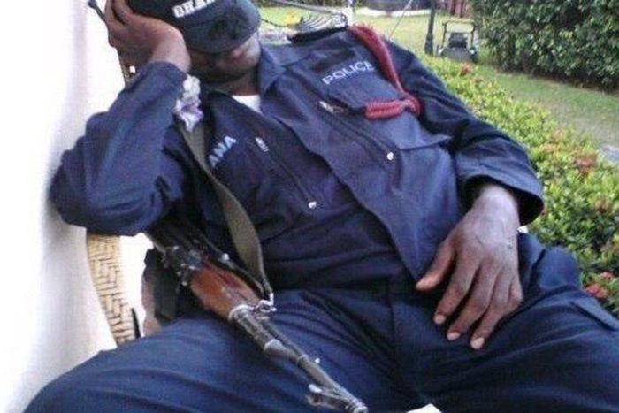 A tired Ghanaian police officer