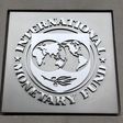 The International Monetary Fund (IMF) logo is seen at the IMF headquarters building during the 2013 Spring Meeting of the International Monetary Fund and World Bank in Washington, April 18, 2013.