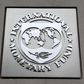 The International Monetary Fund (IMF) logo is seen at the IMF headquarters building during the 2013 Spring Meeting of the International Monetary Fund and World Bank in Washington, April 18, 2013.