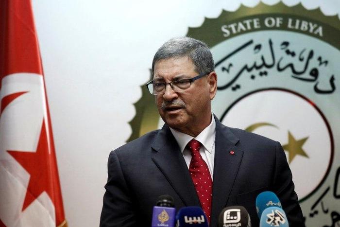 Tunisian Prime Minister Habib Essid delivers a speech during a joint news conference with Prime Minister of Libya's unity government Fayez Seraj (not pictured) in Tripoli, Libya, May 6, 2016.