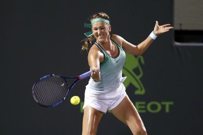 Victoria Azarenka hits a forehand against Angelique Kerber (not pictured) in a women's singles semifinal during day eleven of the Miami Open at Crandon Park Tennis Center. Azarenka won 6-2, 7-5.