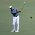 Charl Schwartzel plays a shot on the 15th hole during the first round of the 2016 The Masters golf tournament at Augusta National Golf Club.