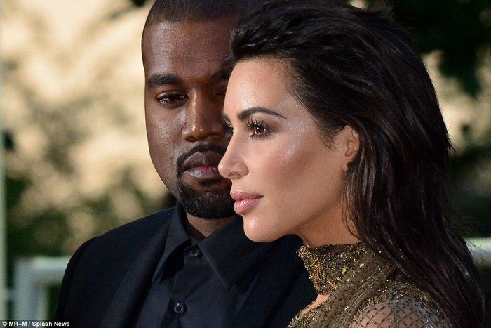 Kanye West and wife Kim Kardashian were all aglow for the Vogue 100 Festival in London.