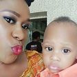 Uche Jombo and son