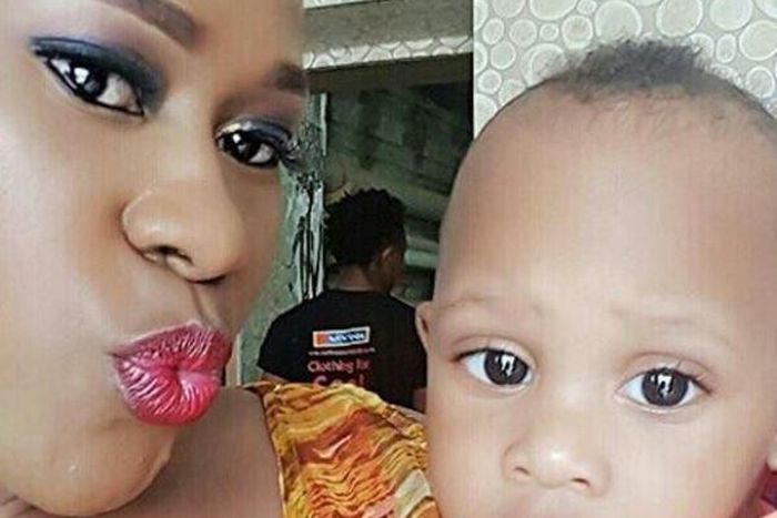 Uche Jombo and son