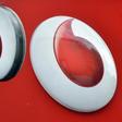 Vodafone branding is seen outside a retail store in London, file.