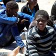 Migrants, who attempted to flee the Libyan coast to head to Europe, are seen after being detained at the coast guard center in the coastal city of Tripoli, Libya, May 16, 2016.