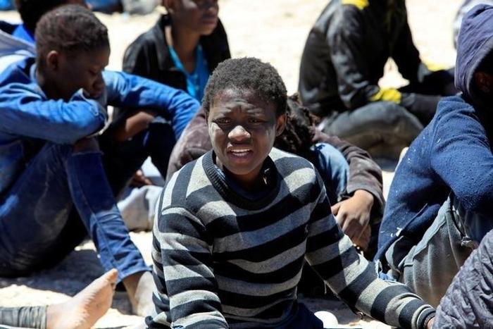 Migrants, who attempted to flee the Libyan coast to head to Europe, are seen after being detained at the coast guard center in the coastal city of Tripoli, Libya, May 16, 2016.