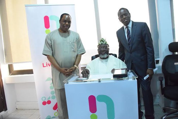 Dr. Tunde Ayeni, chairman NatCom (l) and Kamar Abass, CEO ntel presenting a gift to Barrister Adebayo Shittu, Honourable Minister of Communications at ntel’s Marina Office in Lagos when the Minister paid the company a courtesy visit.