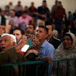 A man asks for a travel permit to cross into Egypt through the Rafah border crossing after it was opened for two days by Egyptian authorities, in the southern Gaza Strip May 11, 2016.
