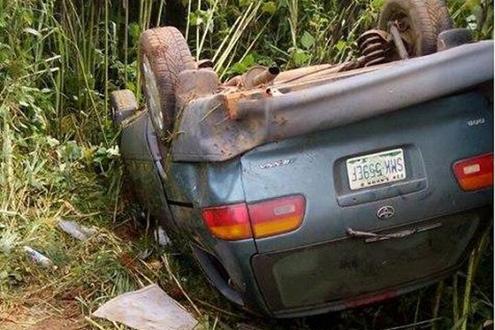 A car lying on its back after somersaulting.