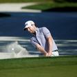 Branden Grace hits his third shot out of a bunker on the 16th hole during the final round of the RBC Heritage golf tournament at Harbour Town Golf Links.