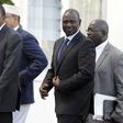 Kenya's President Uhuru Kenyatta (front L) and his Deputy William Ruto (front R) leave the State House after Kenyatta's case at the International Criminal Court (ICC) was dropped, in the capital Nairobi in this December 5, 2014.