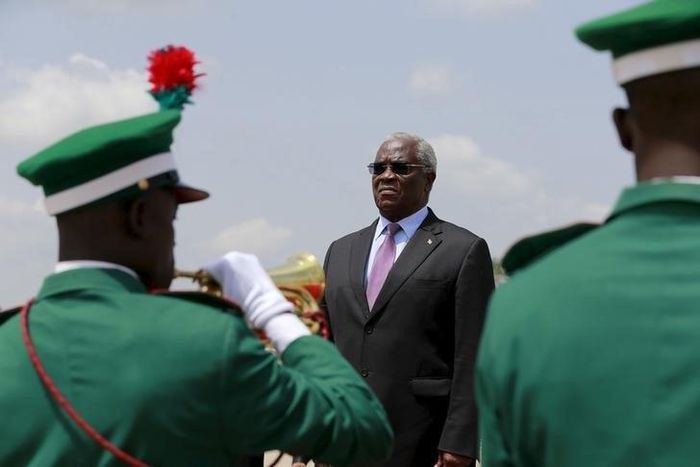 Sao Tome and Principe's President Manuel Pinto da Costa stands on the podium inspecting the honour guards at the airport in Abuja, Nigeria May 28, 2015.