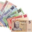 Naira devalues further against dollar at N372 to $1