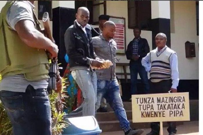 Joachim Ike being led to his permanent home