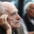 Argentina's former President and Army Chief Reynaldo Bignone sits in a courthouse during the first day of his trial, accused of participating in "Operation Condor", in Buenos Aires March 5, 2013.