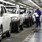 A worker inspects cars at Nissan's manufacturing plant in Rosslyn, outside Pretoria, in a file photo.
