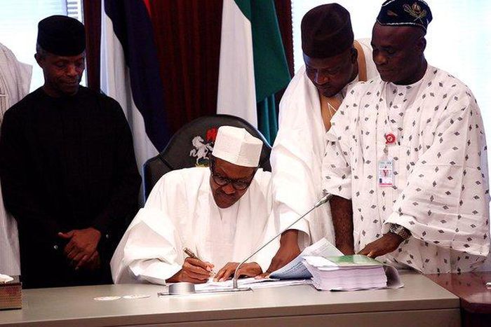 President Muhammadu Buhari signs 2016 budget on May 6, 2016