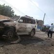 The wreckage of a car destroyed during a suicide bombing is seen near the African Union's main peacekeeping base in Mogadishu, Somalia, July 26, 2016. REUTERS/Ismail Taxta