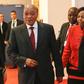 South Africa's President Jacob Zuma (L) leaves after a summit on health and sanitary security in Lyon, France, March 23, 2016.
