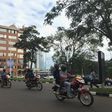 Commuters use motorcycle taxis to make their way through early morning traffic in the Rwanda's capital Kigali, May 11, 2016.