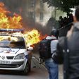 French PM urges unions to scrap violence-marred protests