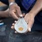Amadou Dabo, 46, displays roughly seven grams of gold he bought from small-scale miners for about $30 in Kalana, August 25, 2012.REUTERS/Joe Penney