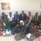 Some of the Ugandans recently facilitated to return home with Uganda's ambassador to Saudi Arabia Sheikh Rashid Yahya Ssemuddu
