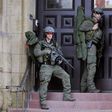 Police officers at the Canadian Parliament after a soldier was shot near the building in Ottawa on October 22, 2014. The parliament is now on lock down