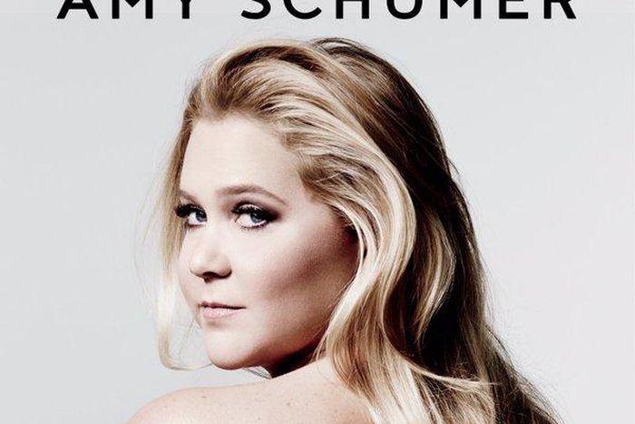 Actress poses topless for the cover of her first book