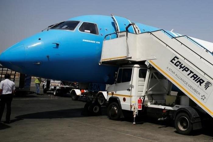 Workers service an EgyptAir flight at International Cairo Airport, Egypt May 21, 2016.