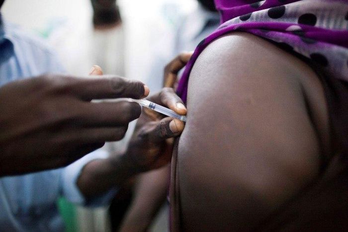 Staff members of the Teaching Hospital receive the first vaccination treatment for yellow fever in El Geneina, West Darfur in this November 14, 2012 handout.