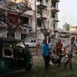 YCivilians evacuate an unidentified man injured from the scene of a suicide car bombing outside Hotel Ambassador on Maka Al Mukaram Road in Somalia's capital Mogadishu, June 1, 2016. REUTERS/Feisal Omar