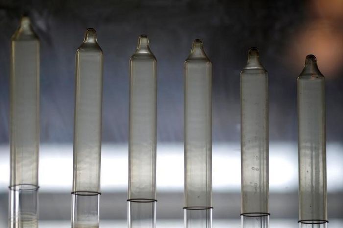 Condoms, produced with natural rubber extracted from the Seringueira tree, are seen at the Natex male condoms plant in Xapuri, Acre state, Brazil, June 23, 2016.