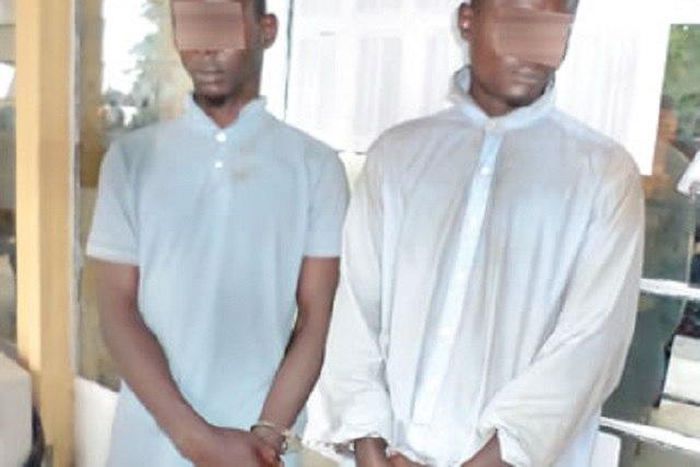 The two suspects, Kelvin Eluwa and Adegboyega Tunji