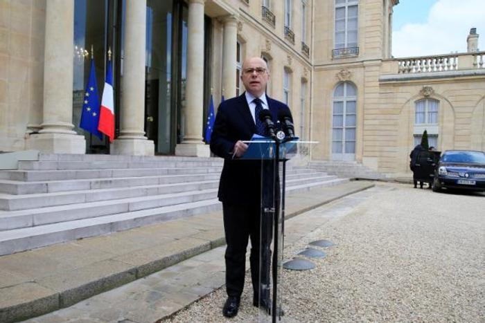 French Interior Minister Bernard Cazeneuve talks to journalists after a meeting about blasts in Brussels at the Elysee Palace in Paris, France, March 22, 2016.