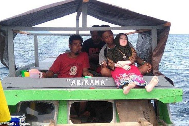 Fallen angel with villagers on a boat trip