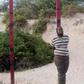 Hassan Hanafi, a former media officer for the Somali Islamist group al Shabaab, stands tied to a pole before his execution by shooting at close range on a field in General Kahiye Police Academy in Somalia's capital Mogadishu, April 11, 2016.