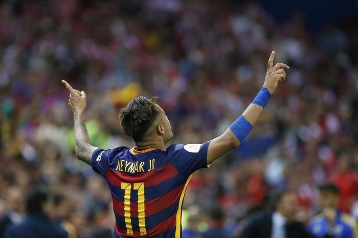 Neymar celebrates after scoring the second goal for Barcelona