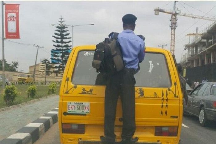 This police officers prefers hitching a ride