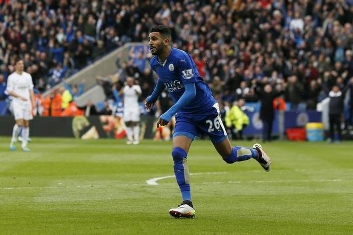 Football Soccer - Leicester City v Swansea City - Barclays Premier League - The King Power Stadium - 24/4/16 Riyad Mahrez celebrates scoring the first goal for Leicester City Action Images via Reuters / Jason Cairnduff Livepic EDITORIAL USE ONLY. No us...