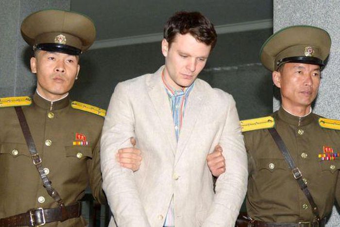 Otto Warmbier, being escorted by North Korean military officers