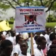 A student holds a sign with an image of Boko Haram leader?Abubakar?Shekau?as she protests for the release of the abducted secondary school girls in the remote village of Chibok, along a road in Lagos May 12, 2014.