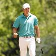 Jordan Spieth reacts after hitting from the straw on the 11th hole during the first round of the 2016 The Masters golf tournament at Augusta National Golf Club.