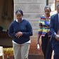 The suspect, Ann Mbaith (Left) being led to a court