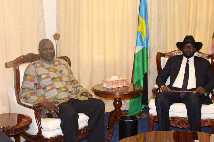 South Sudan's President Salva Kiir (R) and Riek Machar (L) meet after he was sworn-in as the First Vice President at the Presidential House in South Sudan's capital Juba, April 26, 2016.