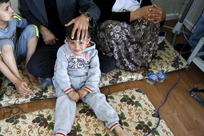 Scarred Yazidi boys escape Islamic State combat training